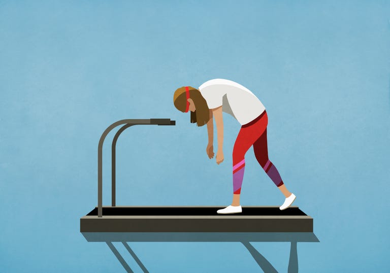 tired woman walking on treadmill