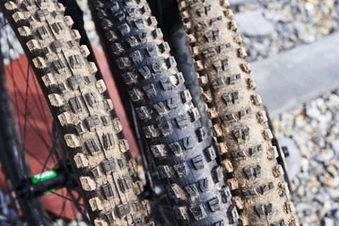 three mountain bike tires in various stages side by side