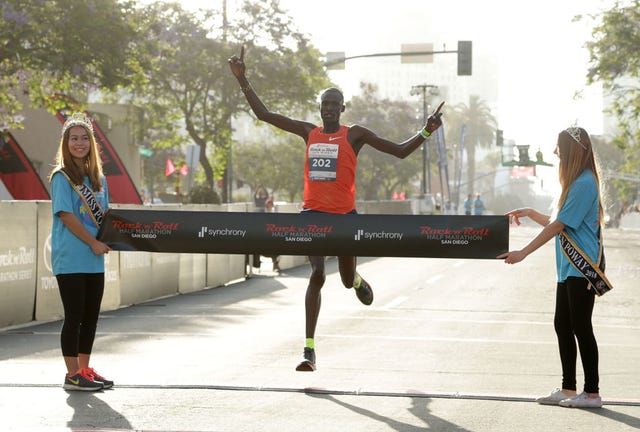 san diego, ca june 03 titus ekiru of kenya crosses the finish line to win the mens synchrony rocknroll san diego 12 marathon on june 3, 2018 in san diego, california photo by jeff grossgetty images for rocknroll marathon