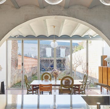 a dining room with a large window