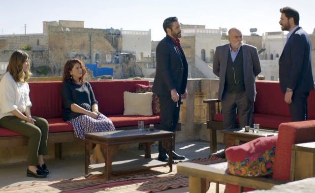 Leg, Trousers, Furniture, Table, Coffee table, Suit, Blazer, Couch, Living room, Suit trousers, 