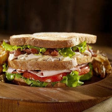 toasted club sandwich with french fries