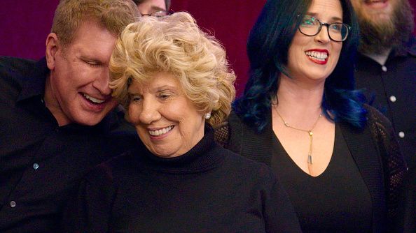 todd and his mother faye chrisley sing in an cappella group