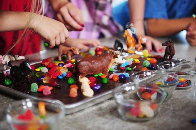 kids decorating todd's birthday cake