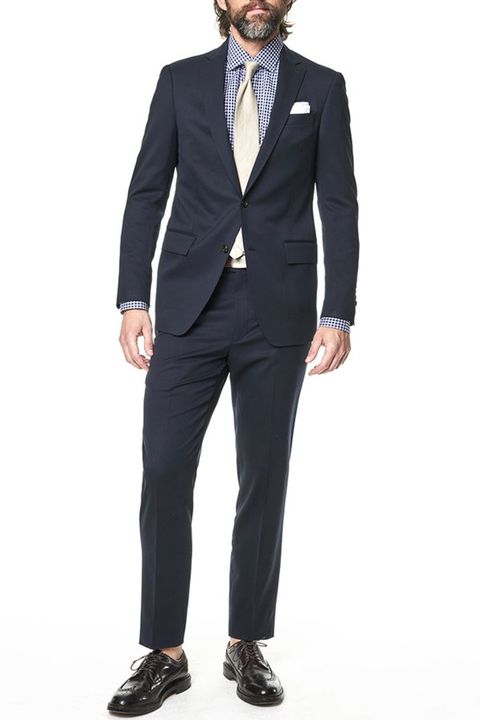 Suit, Clothing, Formal wear, Blazer, Tuxedo, Outerwear, Standing, Jacket, Suit trousers, White-collar worker, 