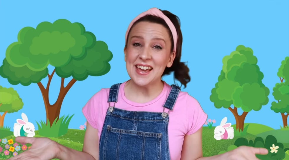 ms rachel in front of an animated background