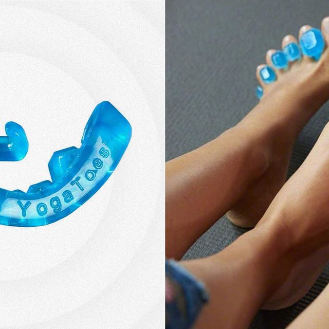 a person's feet with yoga toes on