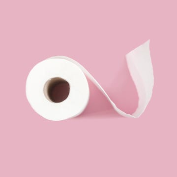 toilet paper roll on pink background