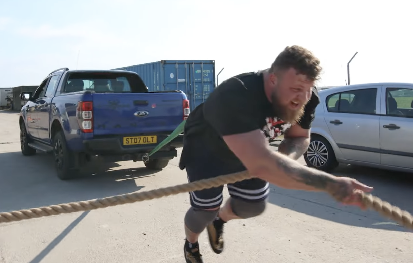 Watch the World's Strongest Man Pull a Truck and Deadlift a Car