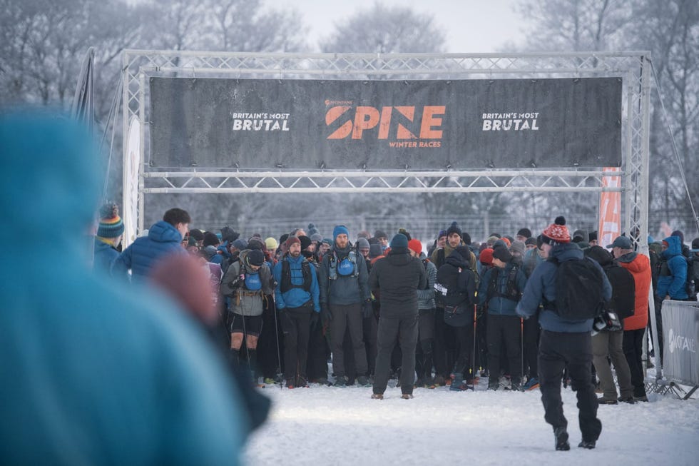 gathering of participants at the start line of a winter racing event