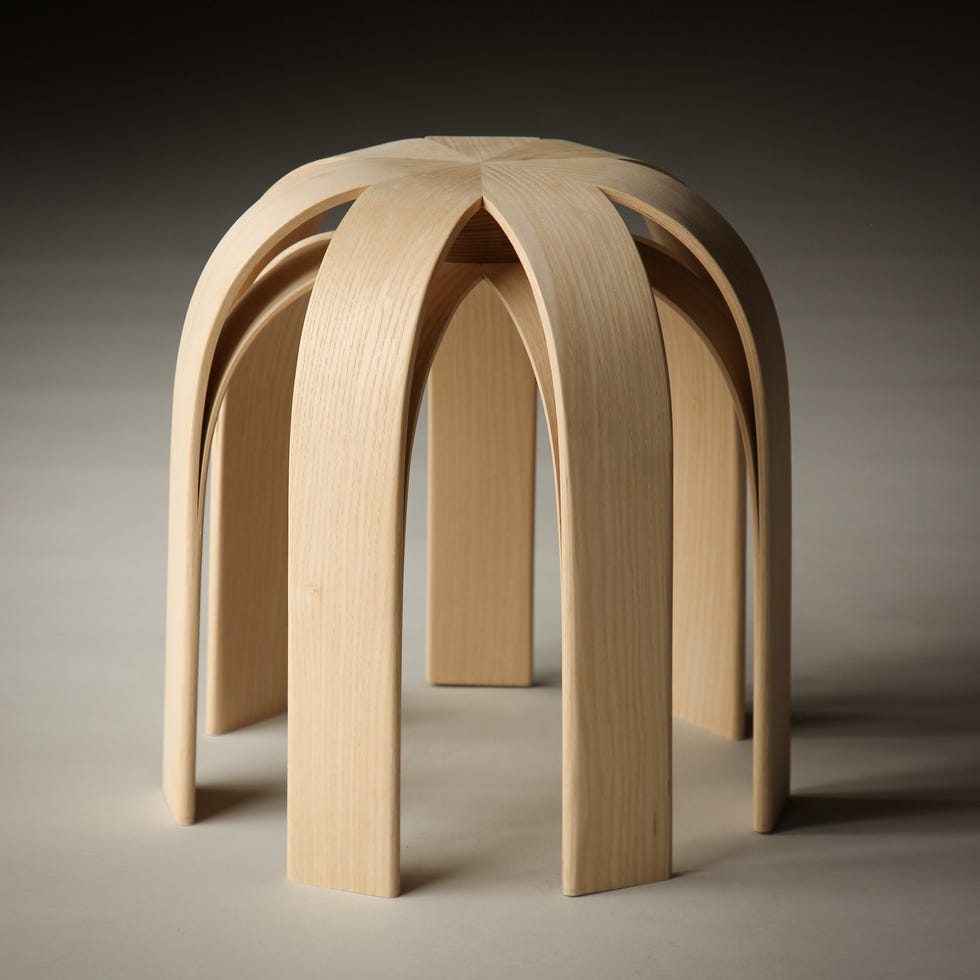 unique wooden stool with curved legs