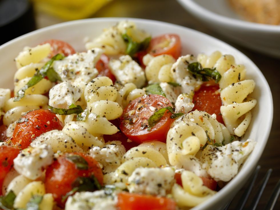 tomato and feta, pasta salad with freshly chopped basil