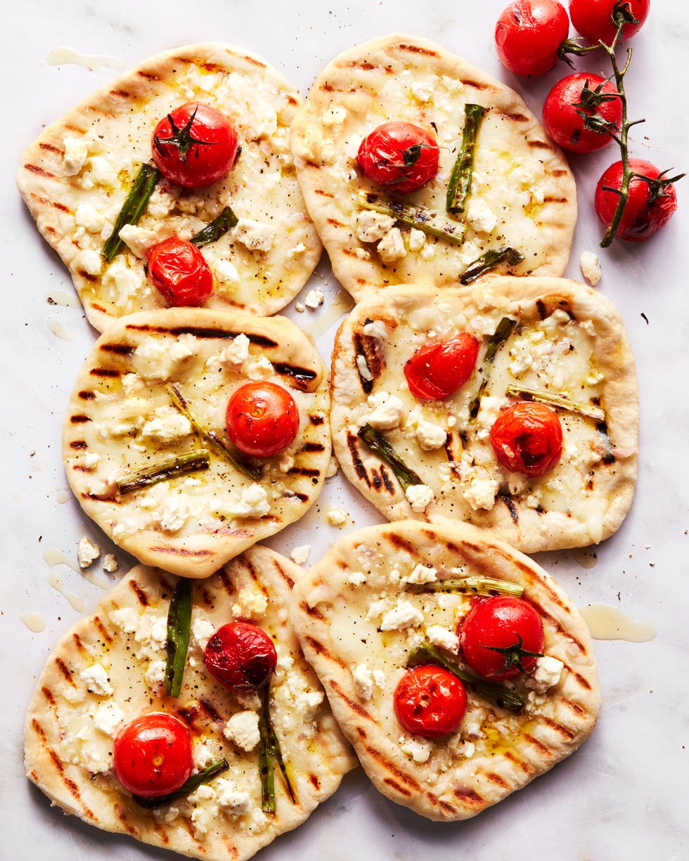 grilled tomato feta pizzettes with scallions and mozzaraella