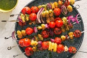tomato gnocchi kebabs with red onion and salsa verde