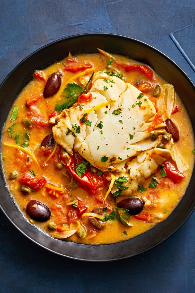 https://hips.hearstapps.com/hmg-prod/images/tomato-poached-cod-with-olives-and-capers-647a46eb35987.jpg?crop=0.668xw:1.00xh;0.260xw,0&resize=980:*
