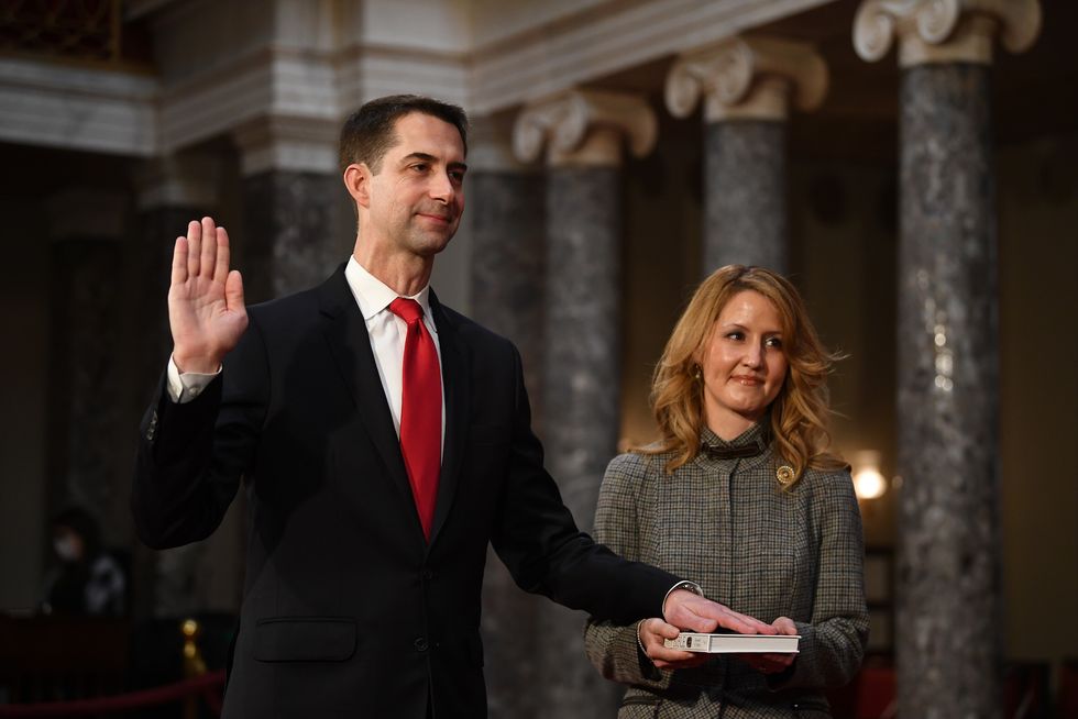 washington, dc   january 3 sen tom cotton, r ark, participates in a mock swearing in for the 117th congress with vice president mike pence, as his wife anna peckham holds a bible, in the old senate chambers at the us capitol building january 3, 2021 in washington, dc both chambers are holding rare sunday sessions to open the new congress on january 3 as the constitution requires  photo by kevin dietsch poolgetty images