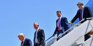 us president donald trump steps off air force one, alongside us attorney general william barr r, ronny jackson 2nd r, candidate for united states representative for texas's 13thcongressional district, and tommy tuberville 2nd lcandidate for united states senate from alabama, upon arrival in dallas, texas, on june 11, 2020, where he will host a roundtable with faith leaders and small business owners photo by nicholas kamm  afp photo by nicholas kammafp via getty images