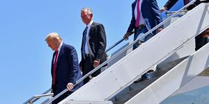 us president donald trump steps off air force one, alongside us attorney general william barr r, ronny jackson 2nd r, candidate for united states representative for texas's 13thcongressional district, and tommy tuberville 2nd lcandidate for united states senate from alabama, upon arrival in dallas, texas, on june 11, 2020, where he will host a roundtable with faith leaders and small business owners photo by nicholas kamm  afp photo by nicholas kammafp via getty images