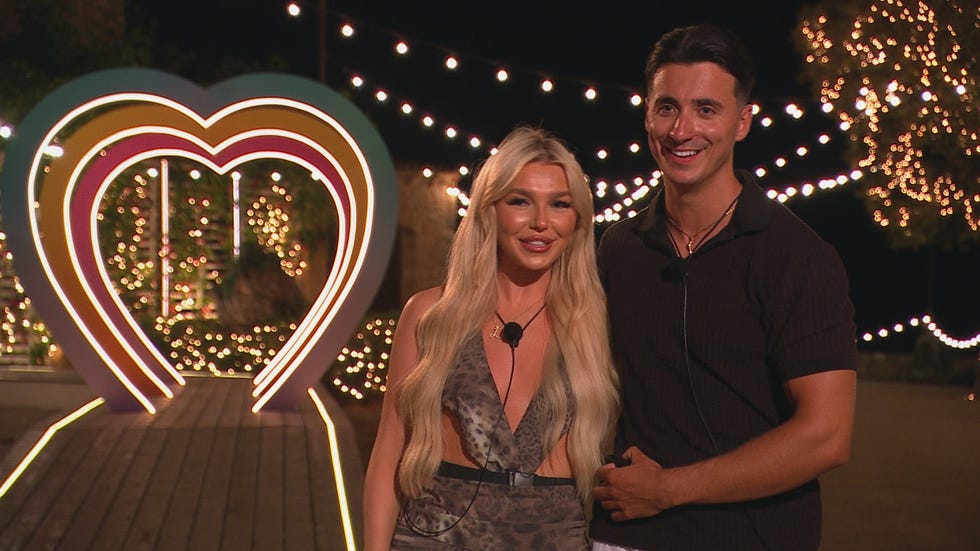 lucy and tommy outside the love island villa
