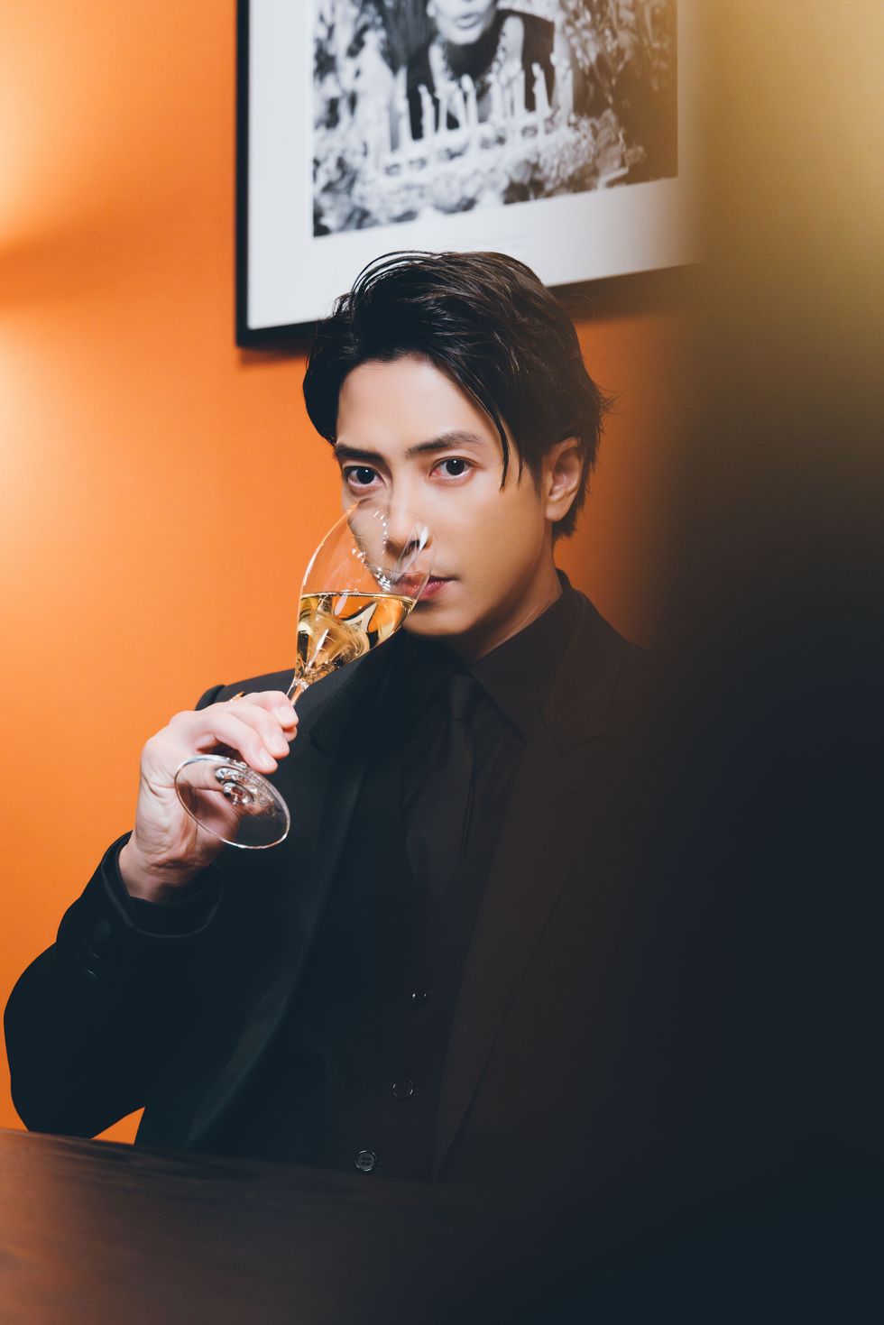 tomohisa yamashita japanese actor hold a glass poured with moet et chandon grand vintage 2015