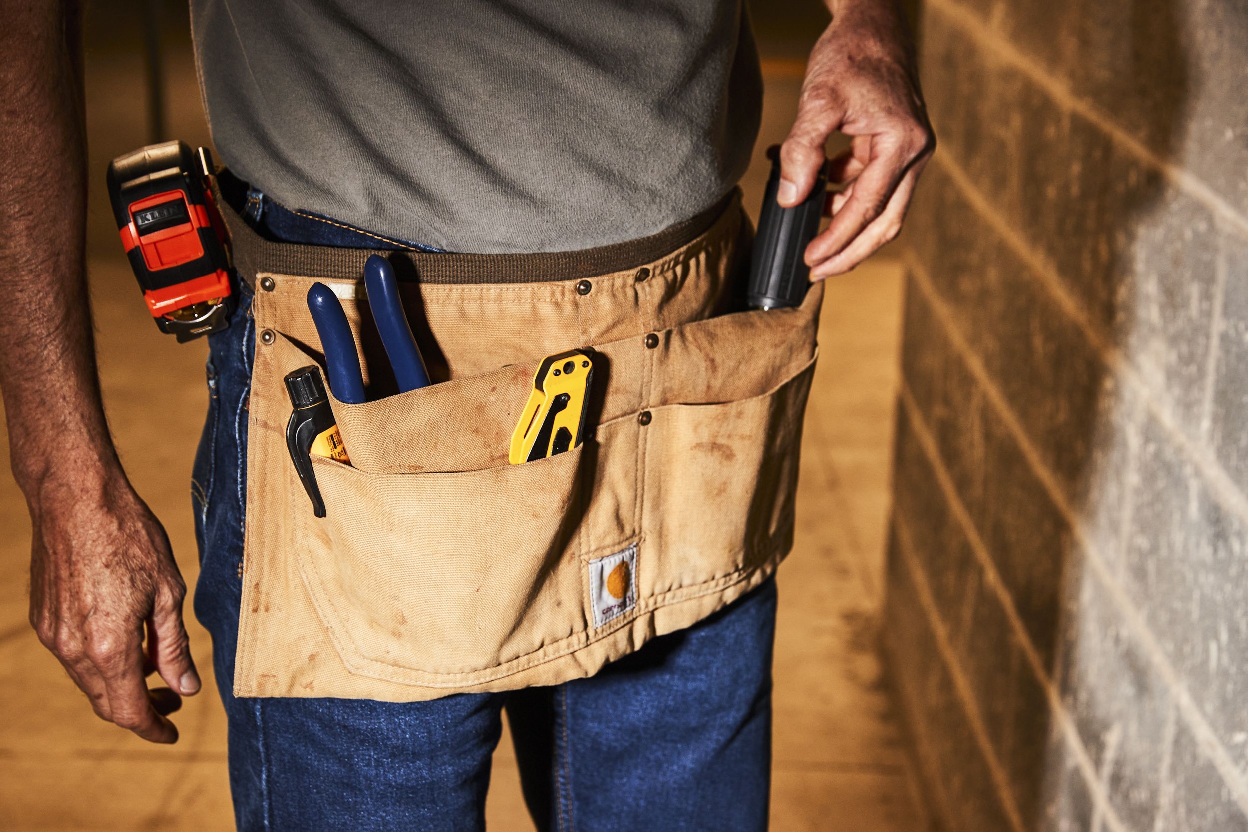 Tool belt of carpenter working on the framing process of home construction  in Southern California Stock Photo