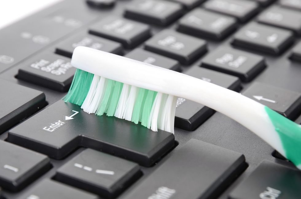 Toothbrush cleaning keyboard