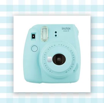 instant print camera in light blue and enameled cast iron dutch oven in white