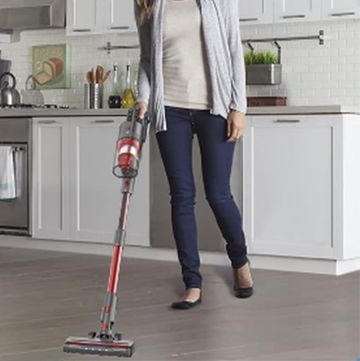 cordless stick vacuum cleaner in action