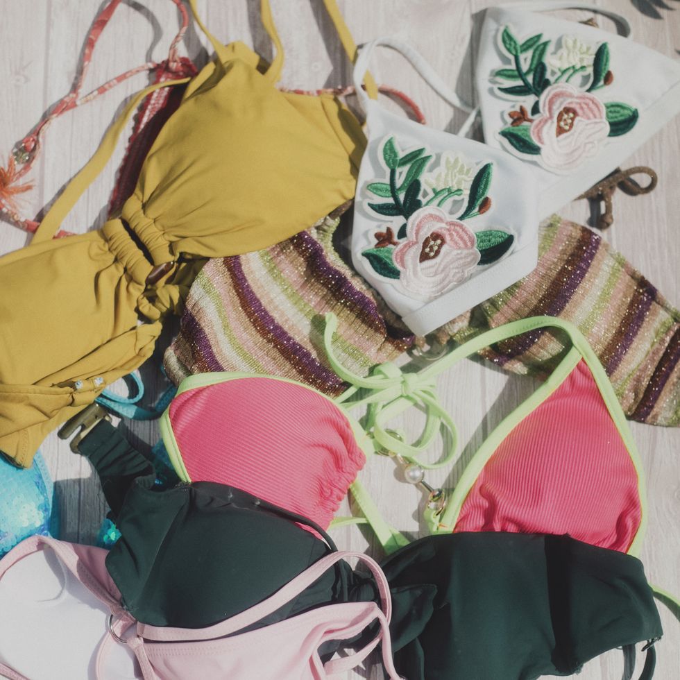 top view bikinis mess on floor
