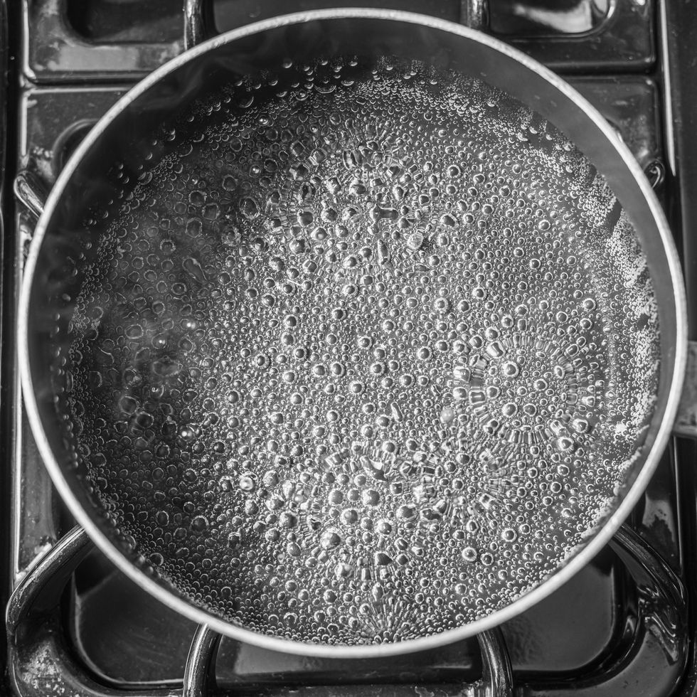 top view of an empty pan with bubbles and steam royalty free image 1698772865