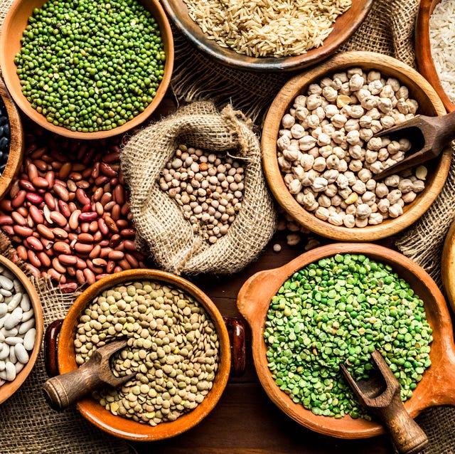 top view of leguminous seeds on rustic wood table