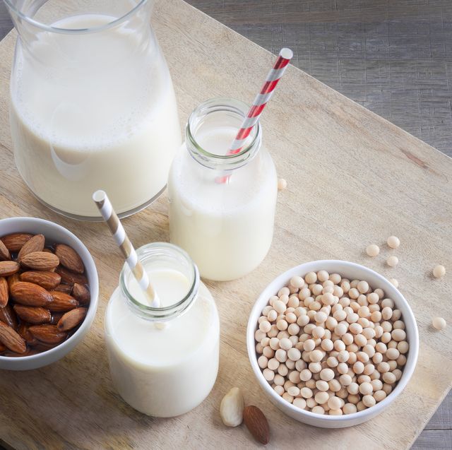 top view of vegan drinks, almond milk and soy milk