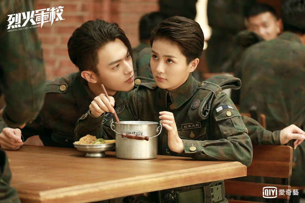 Table, Sharing, Black hair, Serveware, Cuisine, Military uniform, Military person, Bowl, Meal, Mixing bowl, 