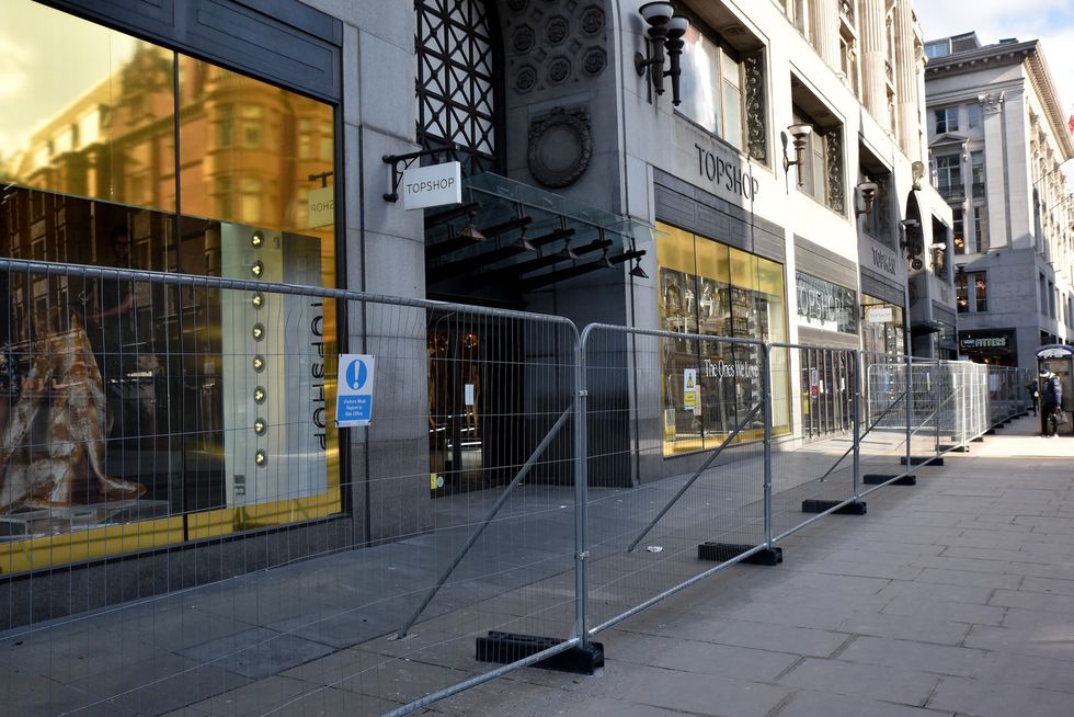 london, united kingdom february 12, 2021 topshop is now part of asos, the oxford street flagship store is now fenced off and being emptied