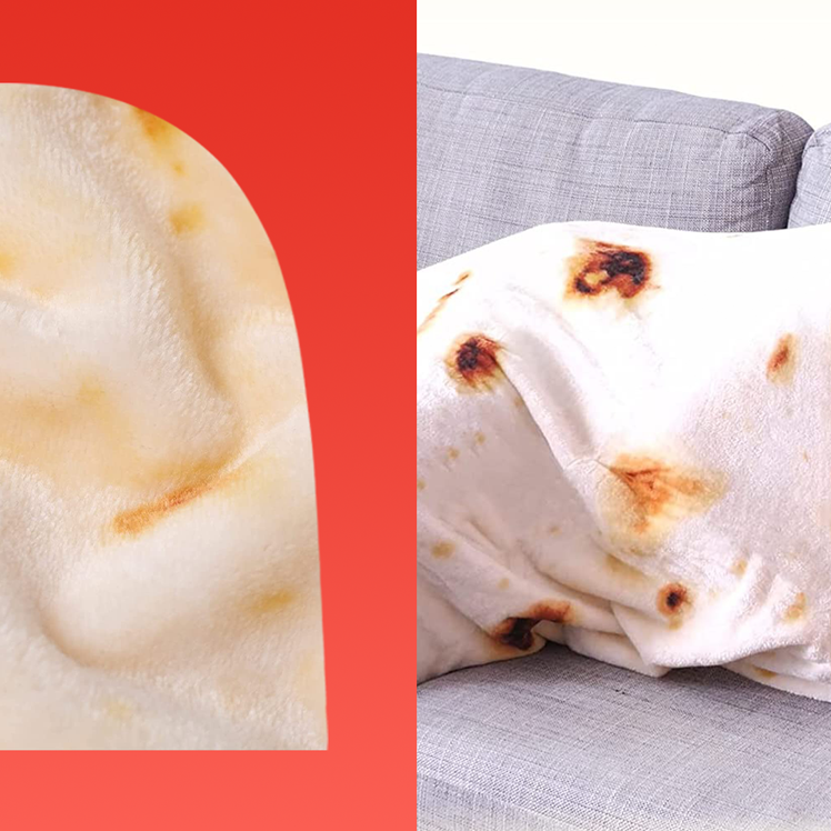 man wrapped in tortilla blanket on couch