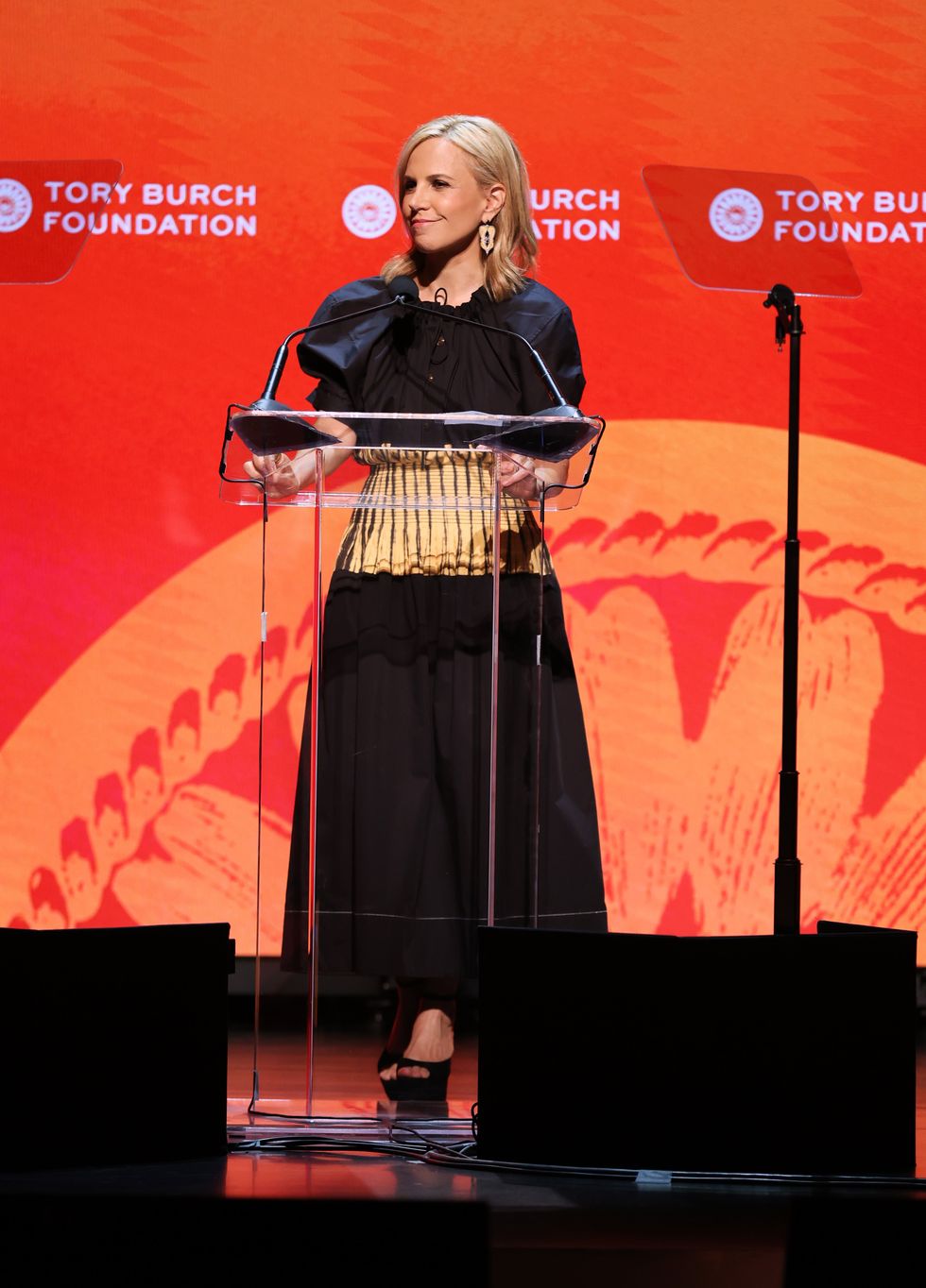 tory burch speaks onstage at the 2022 embrace ambition summit