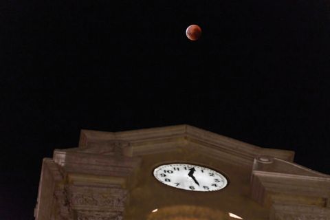 a total moon eclipse is seen rising in firmat