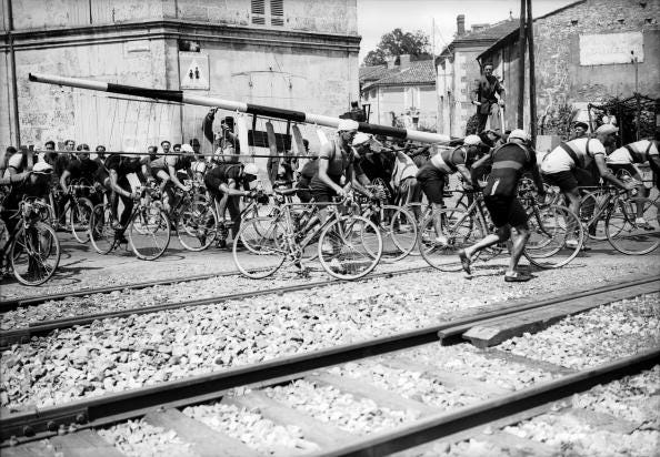 france   july 16  racers trying to cross the railway tracks with their bicycles on their shoulders during the 1939 tour de france at tonnay in the charente department of france  photo by keystone francegamma keystone via getty images