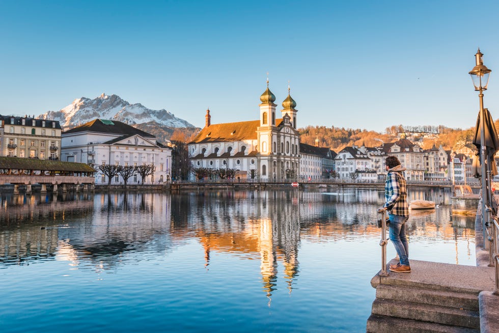 tourist admiring the view in lucerne, switzerland