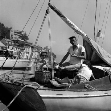 tourists aboard a sailing boat portofino italy,