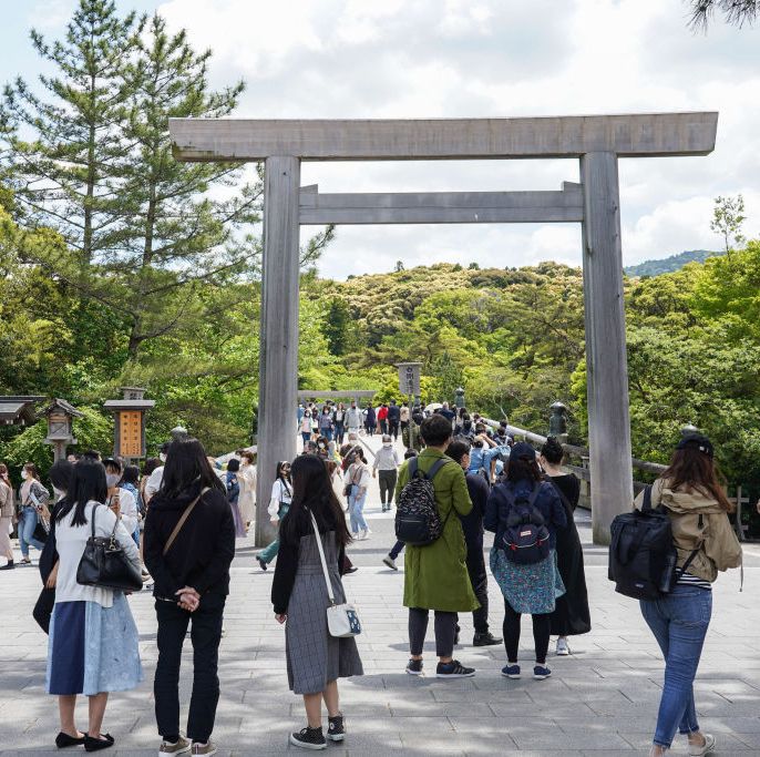 tourists wearing face masks visit ise jingu shrine during