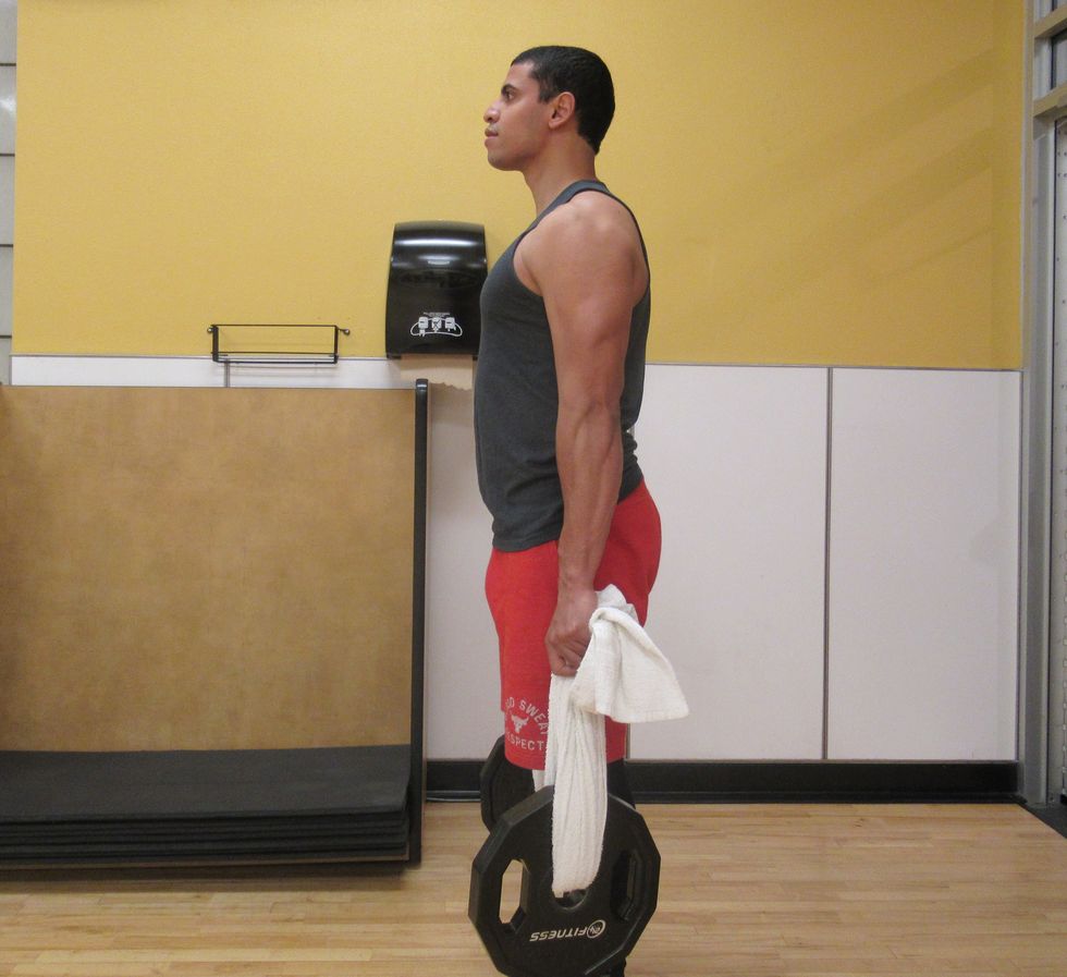 Shoulder, Arm, Standing, Joint, Vehicle, Leg, Physical fitness, Knee, Unicycle, Human leg, 