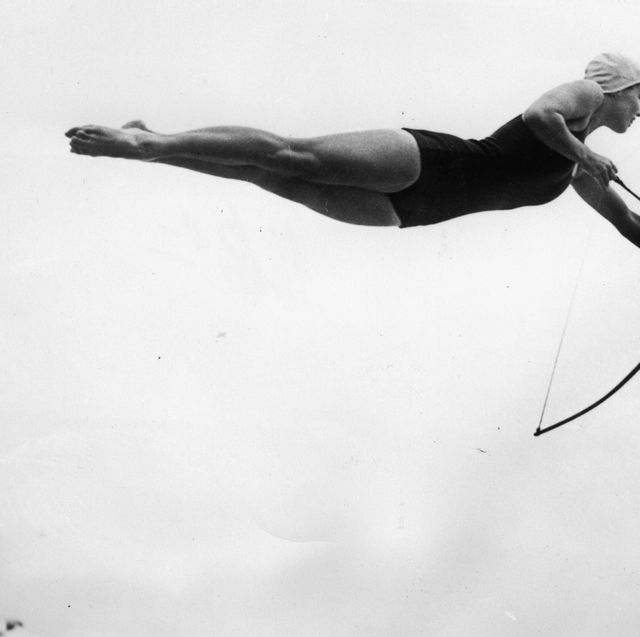 tower jumping with bow and arrow, photograph, may 10th 1937