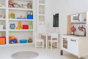 kids room with toys organized and stored away neatly