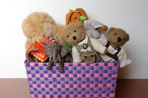 toy organization tips toy box overflowing with stuffed animals and toys