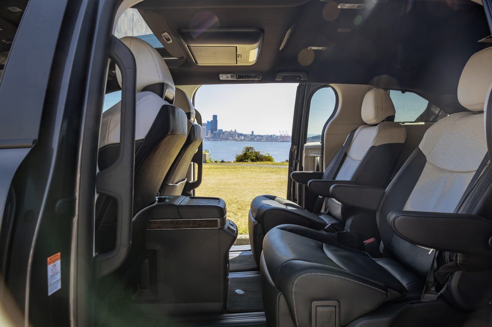 Interior view of the 2025 Toyota Sienna showing the spacious second-row captain's chairs with ample legroom.