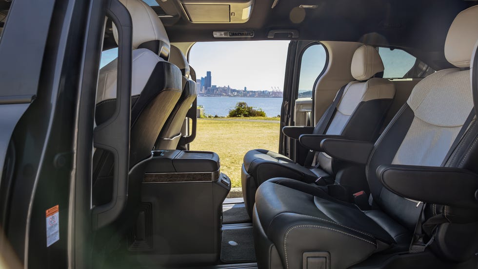 Interior view of the 2025 Toyota Sienna showing the spacious second-row captain's chairs with ample legroom.