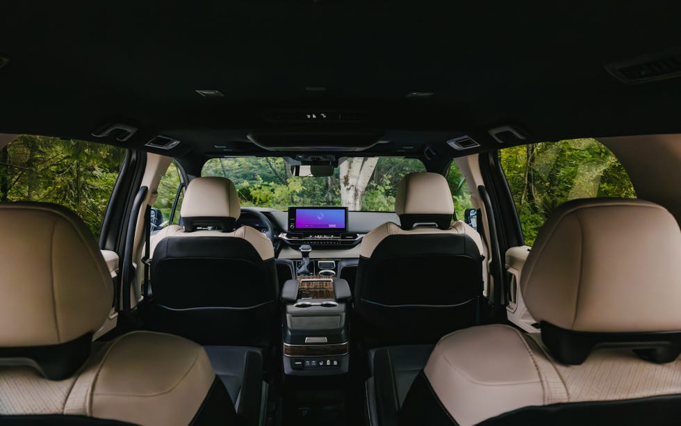 Close-up of the 2025 Toyota Sienna's aggressive alloy wheels and sporty exterior styling.
