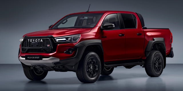 a red truck on a grey background