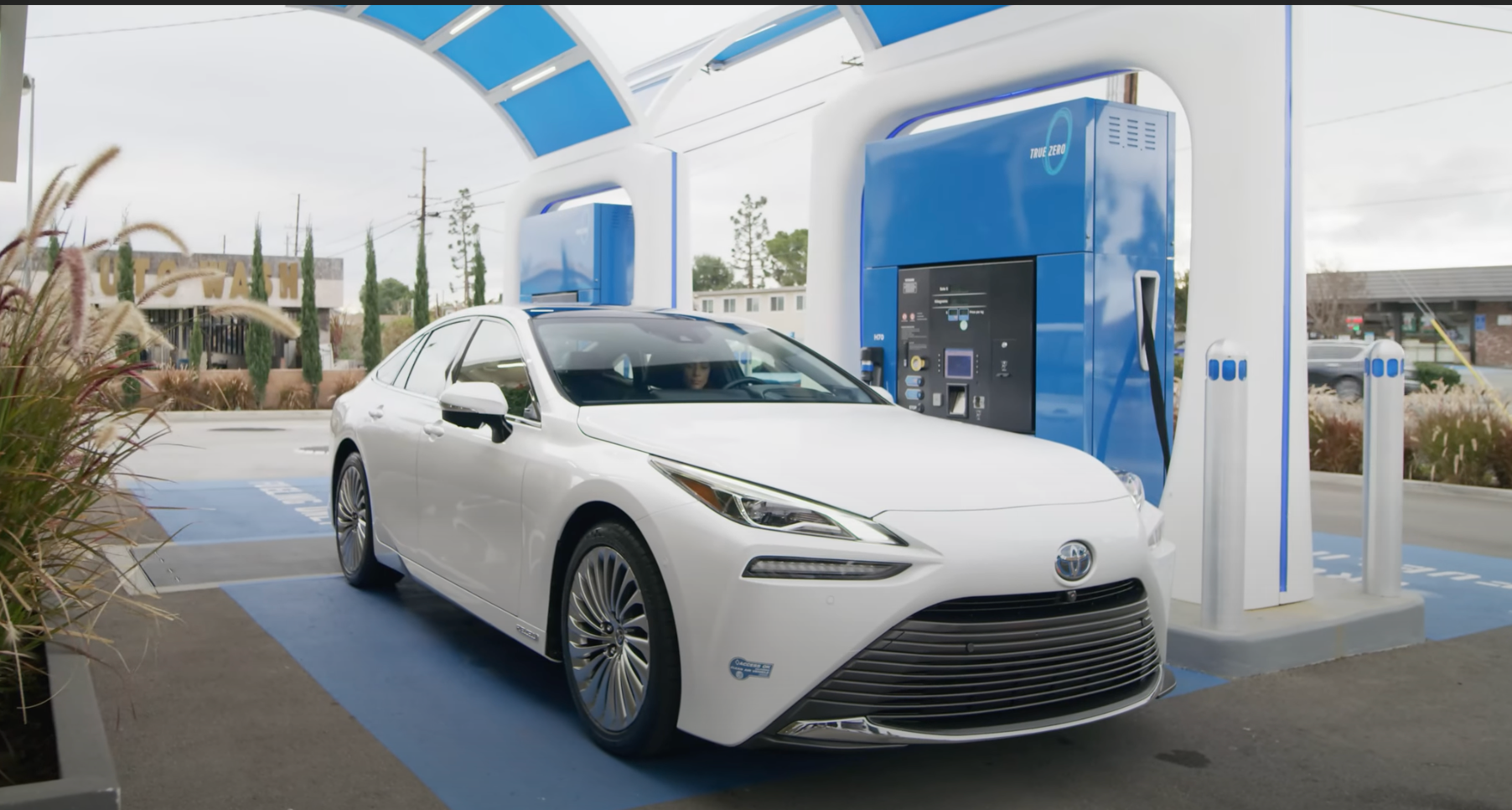 Toyota Mirai at a fueling station